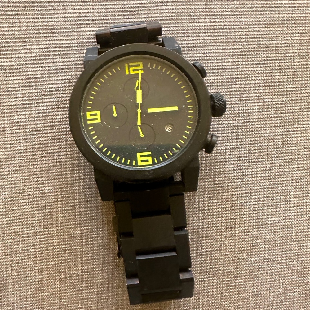 Black Nixon watch.